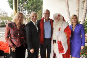 Gotta love President Dr. James Doti of Chapman University, Ray Jacobi, Santa, and Kim Smith!